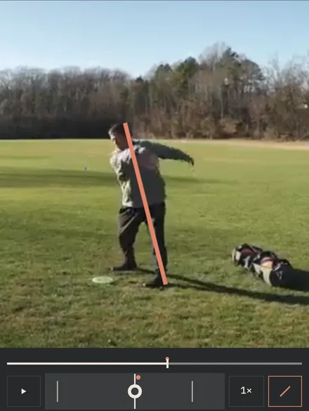 The Film screen: a backhand throw on a field, paused near the release, with one line drawn from the head to the plant foot and the frame scrubber below.